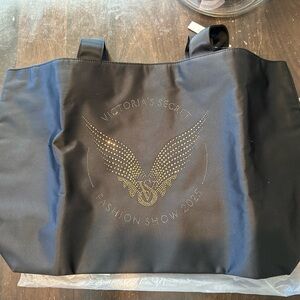 Victoria's Secret Black Duffel Bag with Gold Accents